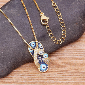 Collier Avec Pendentif Tongue Oeil Bleu Et Zircon