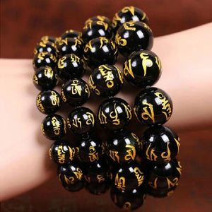 Bracelet Noir Gourmette Bouddhiste Amulette