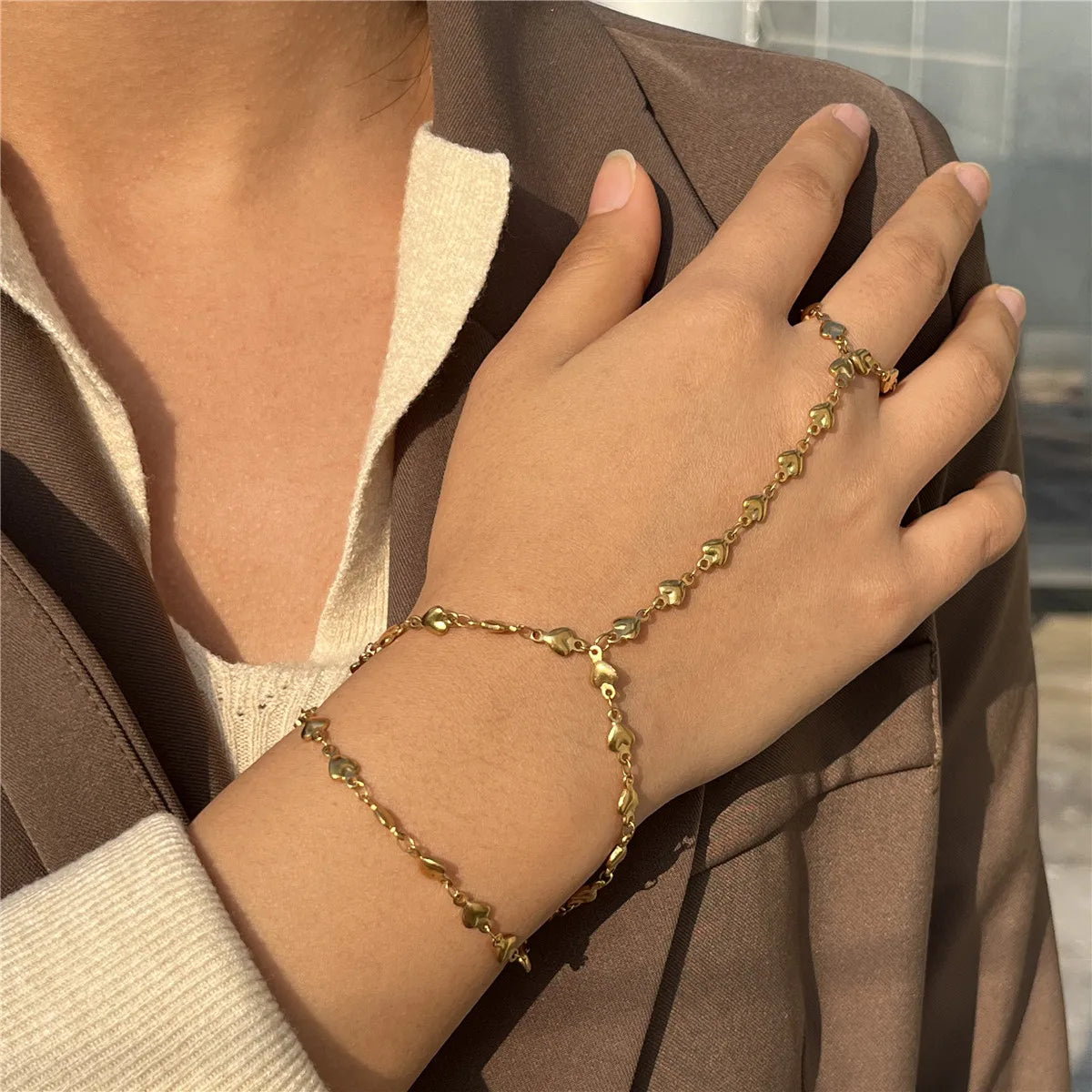 Hand- und Fingerkette Herz - Handarmband für Damen Gold