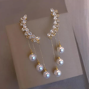 Boucles d'Oreilles Pendantes avec Perles Blanches 2