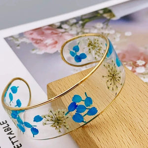 Bracelet Gourmette Fleur en Résine Transparente bleu a