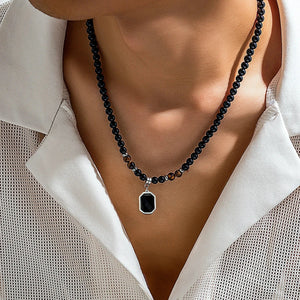 Collier Pendentif en Perles Noires pour Homme