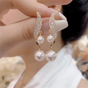 Boucles d'Oreilles Pendantes avec 2 Perles et Strass