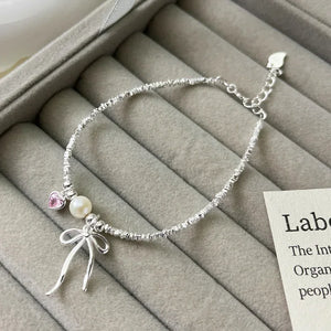 Bracelet Gourmette Noeud de Papillon et Perle