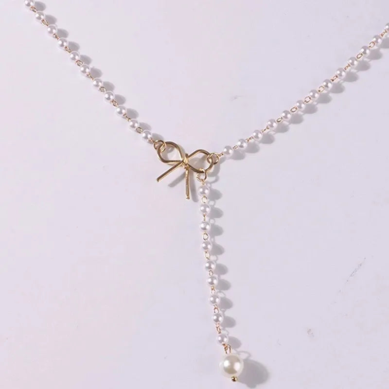 Collier de Perles avec Pendentif Noeud blanc