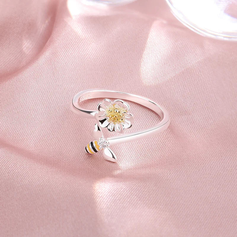 Adjustable bee and flower ring