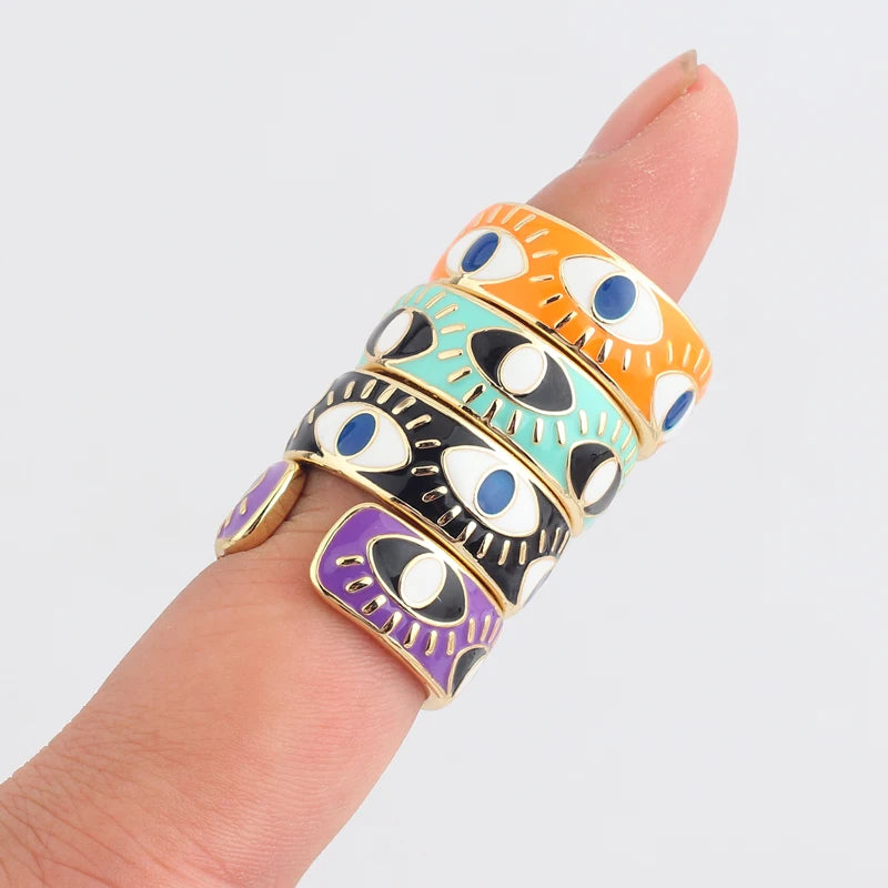 Verstellbarer Emaille-Ring mit blauem-Auge-Motiven in Gold und Violett