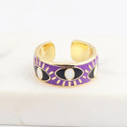 Verstellbarer Emaille-Ring mit blauem-Auge-Motiven in Gold und Violett