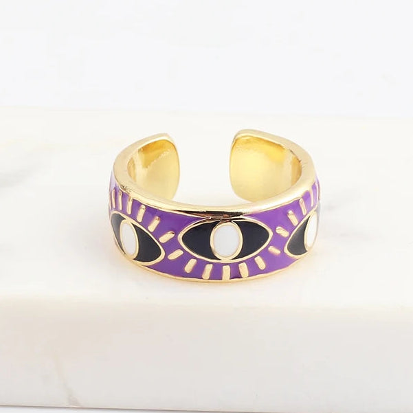 Verstellbarer Emaille-Ring mit blauem-Auge-Motiven in Gold und Violett