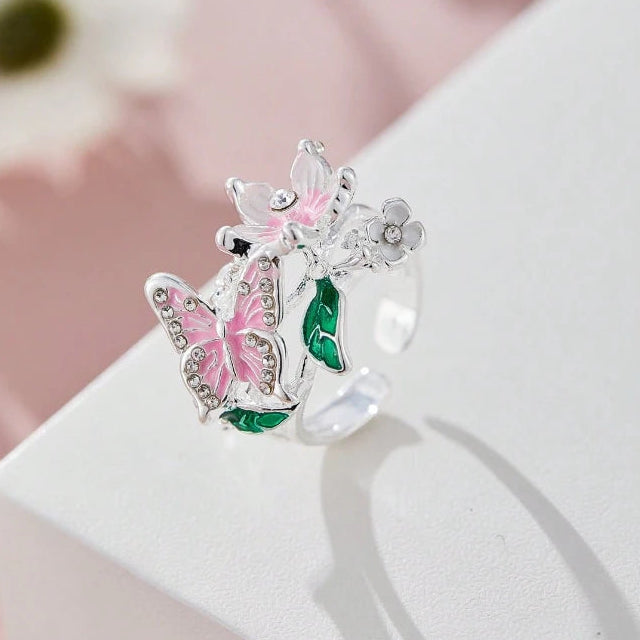 Adjustable cherry blossom and butterfly ring in silver