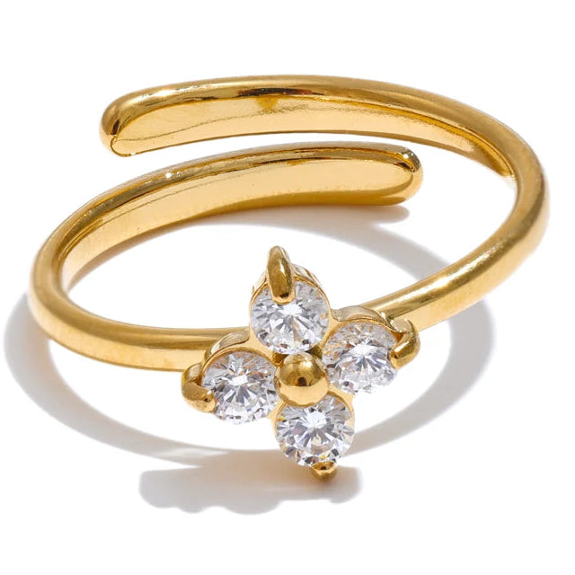 Justerbar ring med kløver og strass i guld