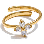Justerbar ring med kløver og strass i guld
