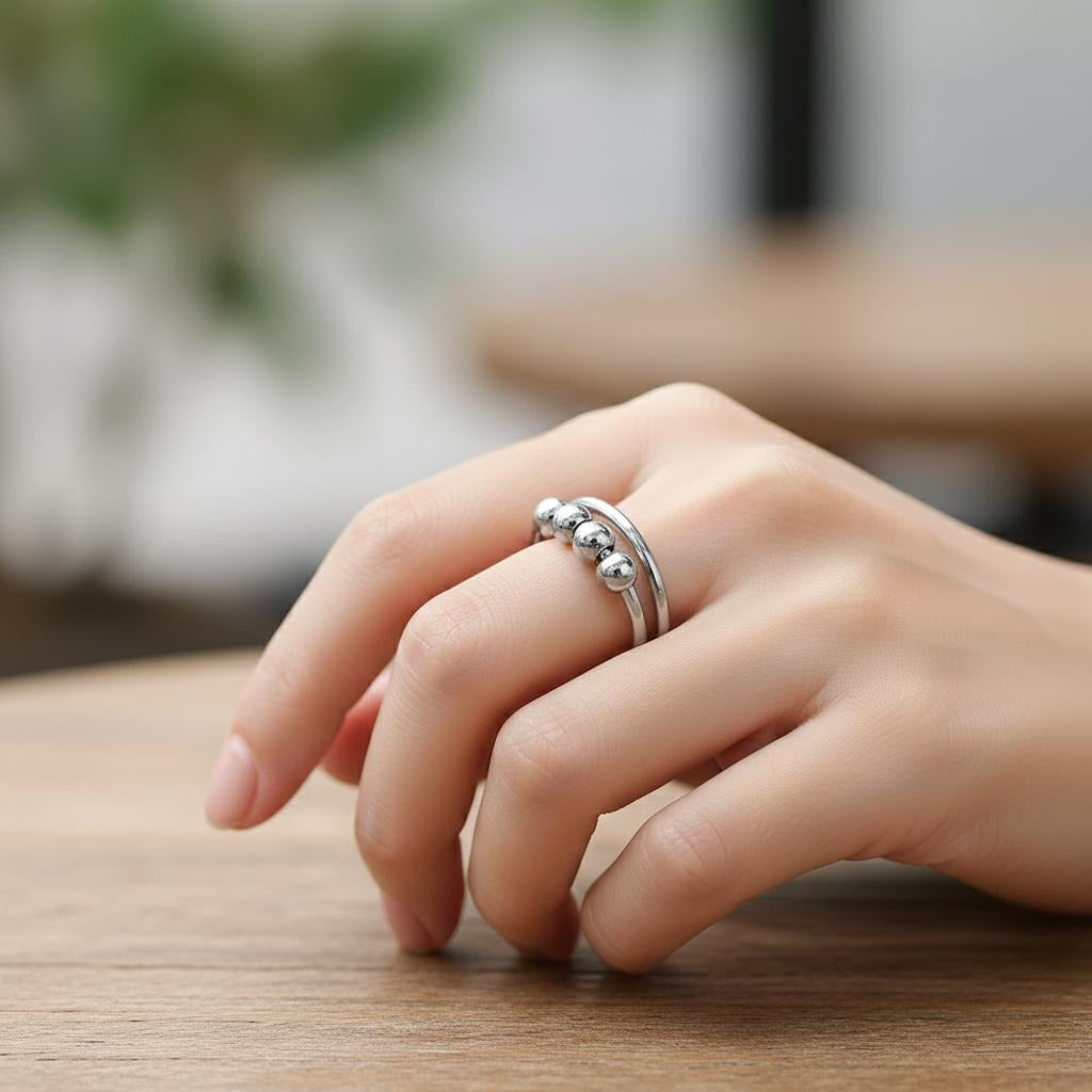 Anti-Stress-Ring mit drehenden Perlen 