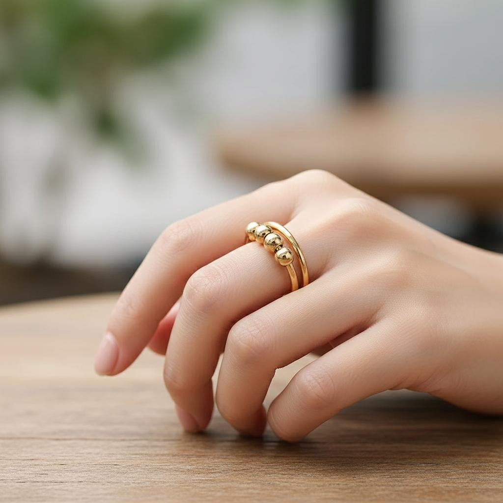 Anti-Stress-Ring mit drehenden Perlen 