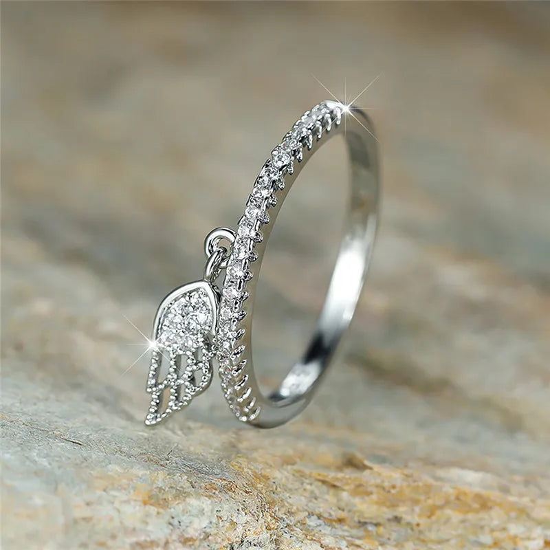 Bague avec pendentif ailes d'ange argent