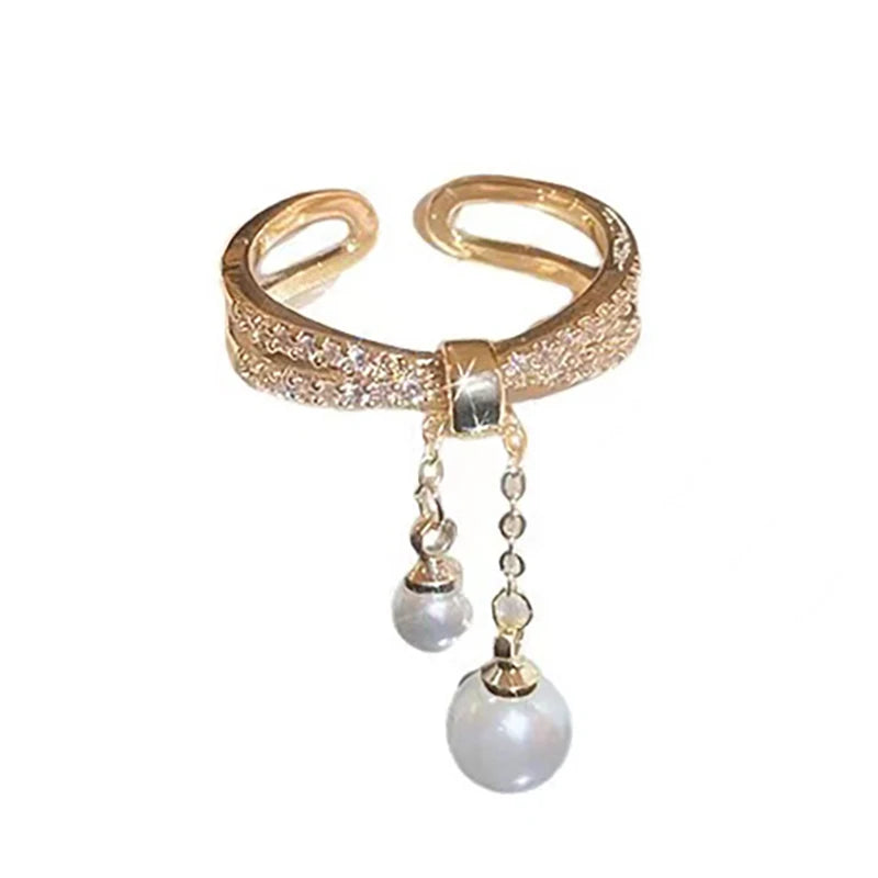 Bague avec perles suspendues