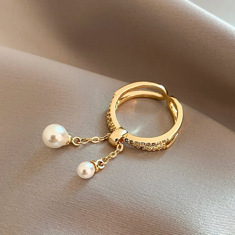 Bague avec perles suspendues