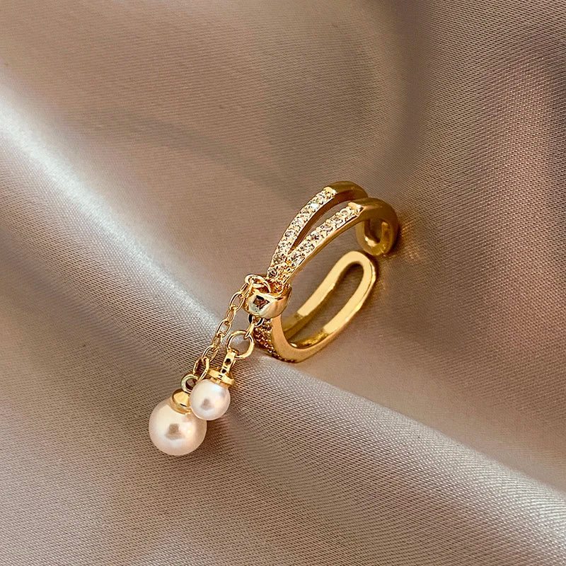 Bague avec perles suspendues