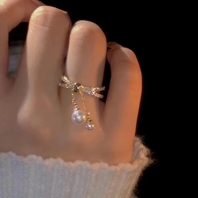 Bague avec perles suspendues