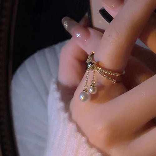 Bague avec perles suspendues