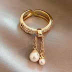Bague avec perles suspendues