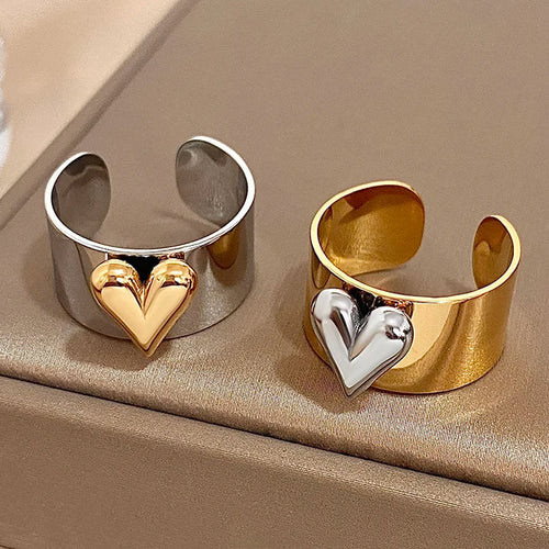 Ring med upphöjt hjärta i guld