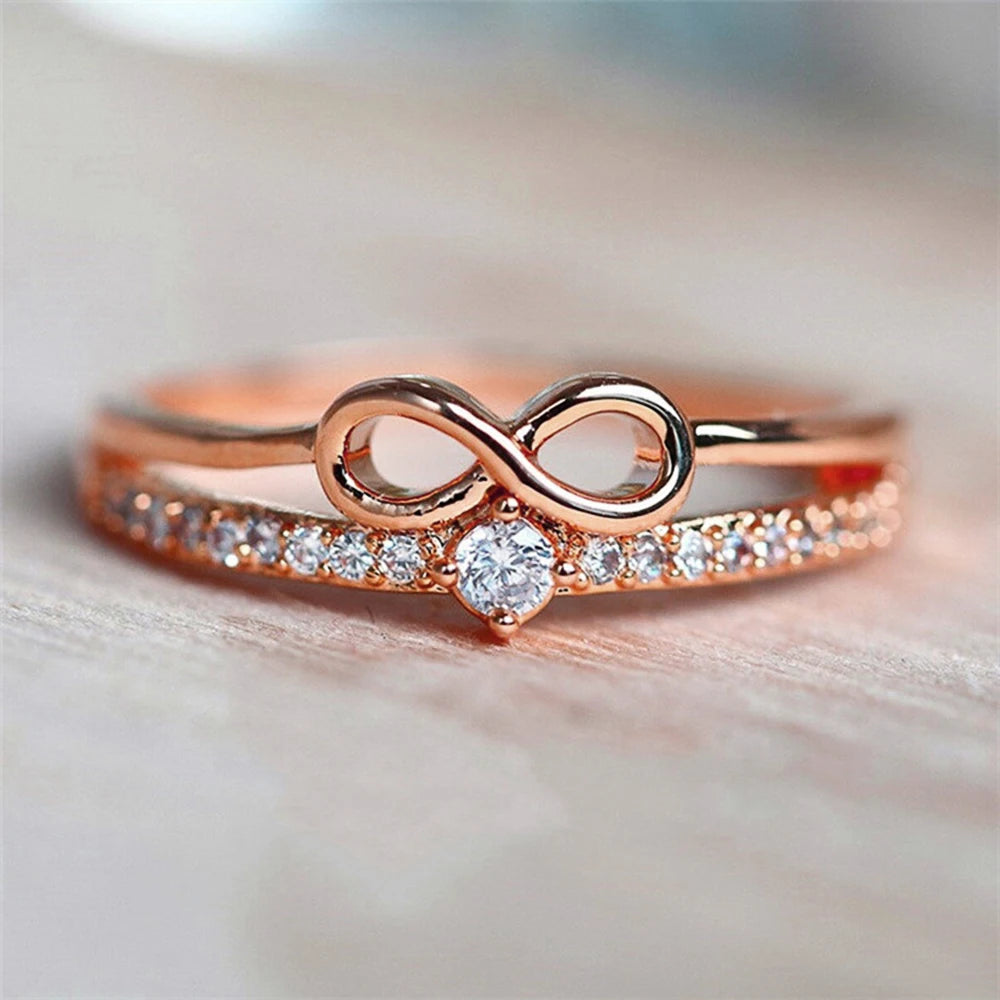 Bague double rang et symbole infini or rose