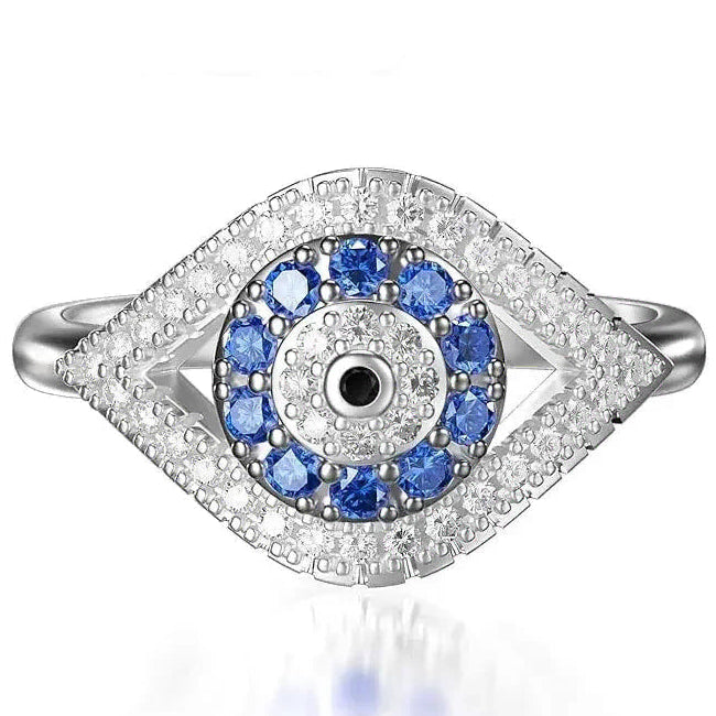 Bague en forme d'oeil pavé de cristaux et oeil bleu