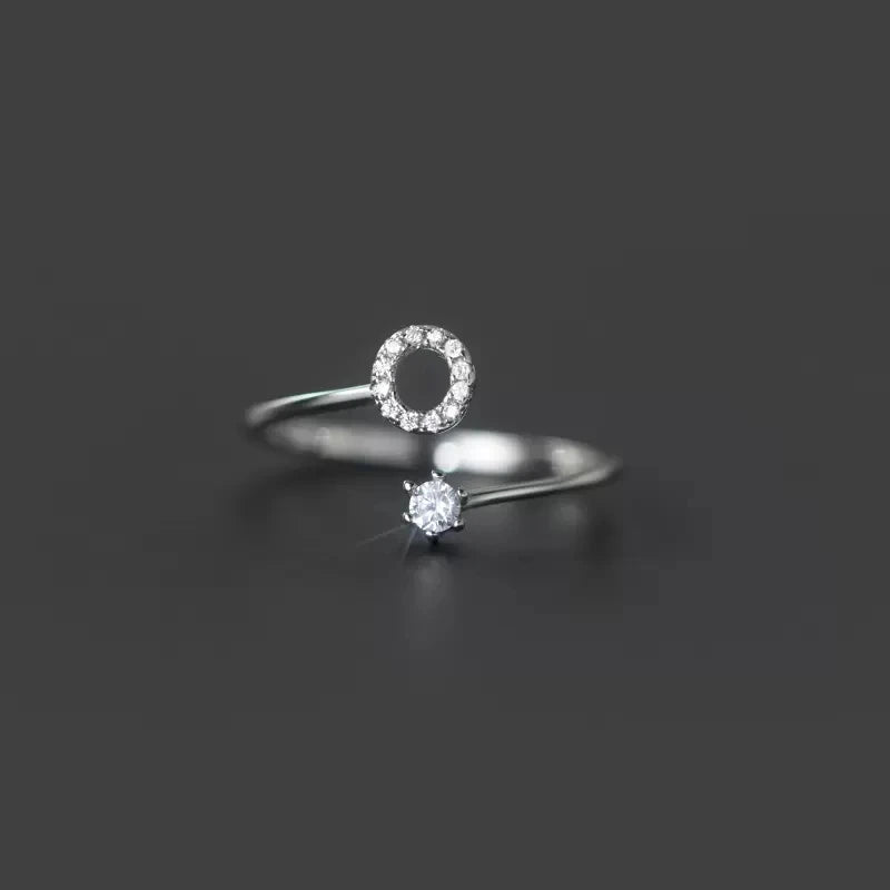 Kvinde initialring o