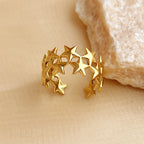 Anillo ancho multiestrellas de oro