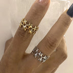 Anillo ancho multiestrellas de oro