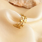 Anillo ancho multiestrellas de oro