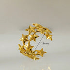 Anillo ancho multiestrellas de oro