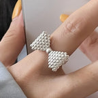 Bague noeud papillon et perles