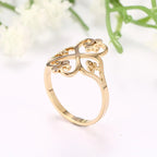 Durchbrochener Kleeblatt-Ring mit vier Herzen aus Gold