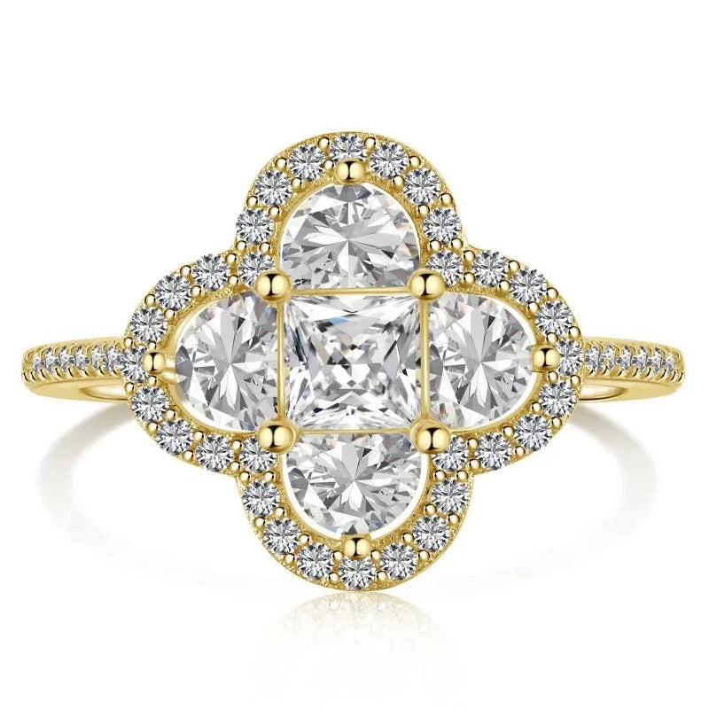Anello quadrifoglio luminoso con cristalli oro