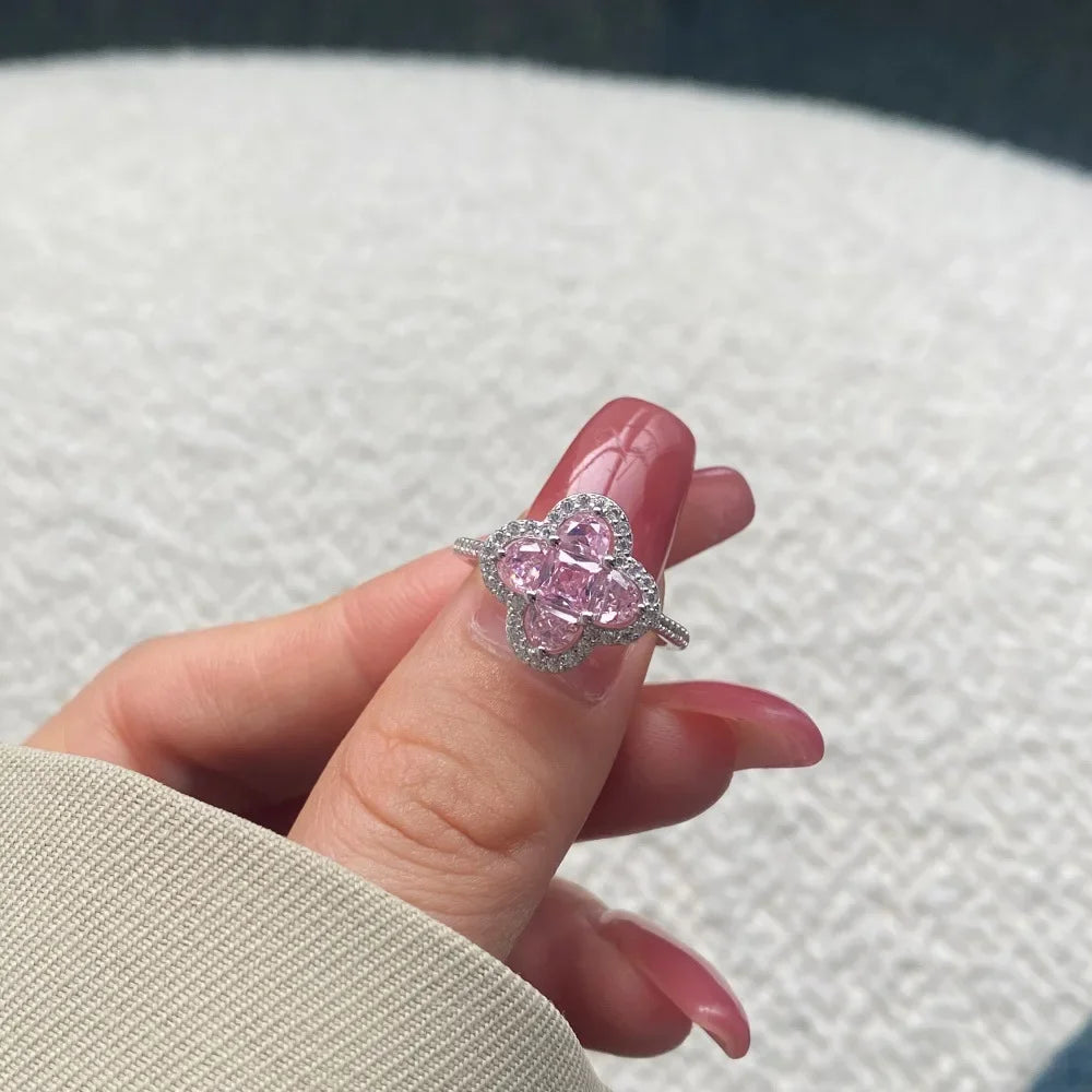 Anello quadrifoglio luminoso con cristalli argento e rosa