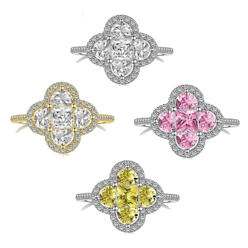 Anello quadrifoglio luminoso con cristalli oro