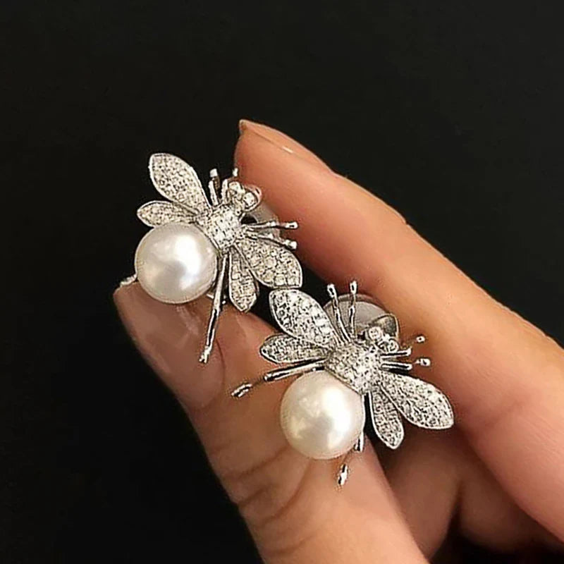 Women's bee and pearl earrings