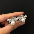 Women's bee and pearl earrings