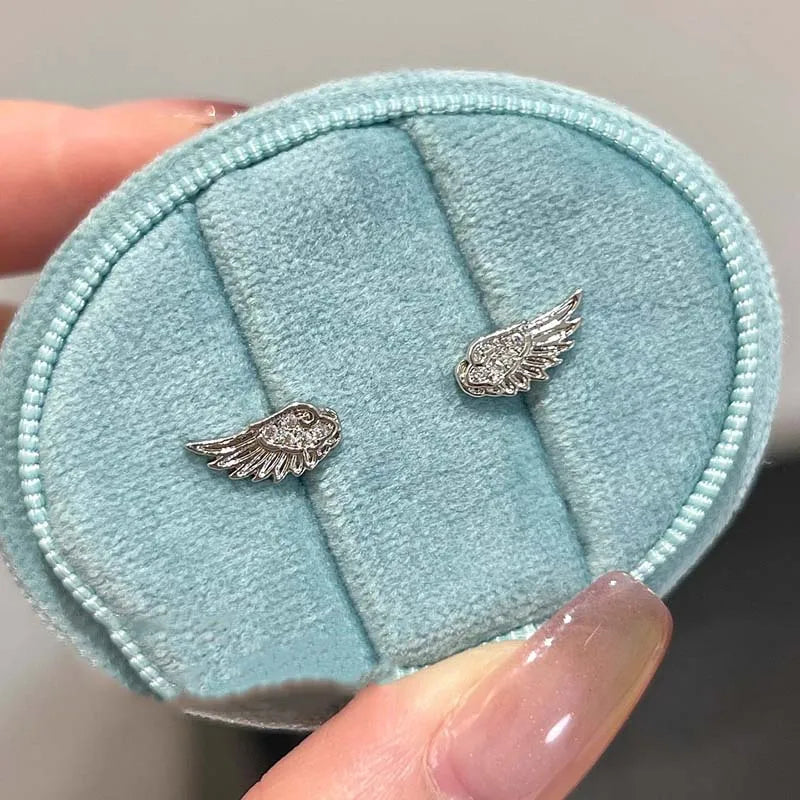 Boucles d'oreilles ailes d'ange blanc