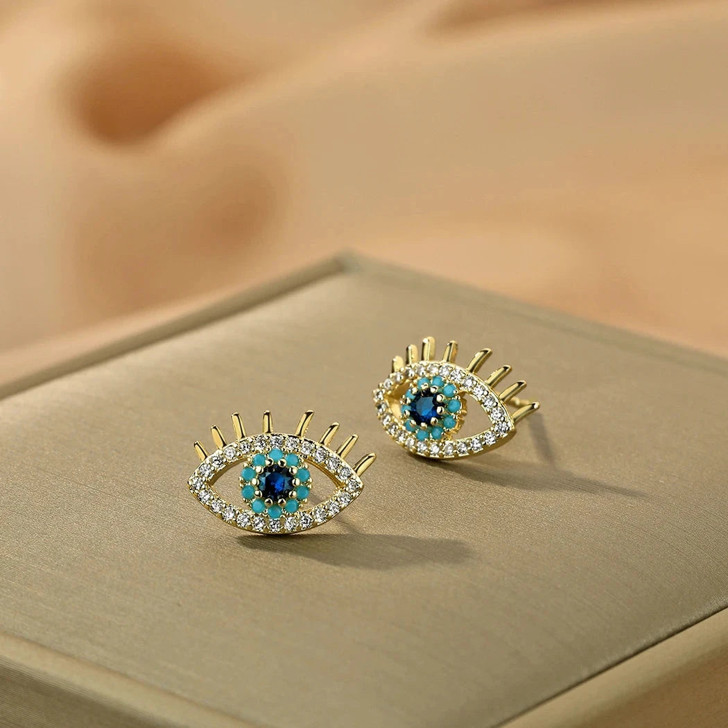 Boucles d'Oreilles Clou Oeil Bleu et Strass