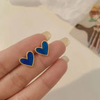 Boucles d'oreilles coeur effet nacré bleu