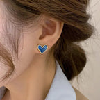 Boucles d'oreilles coeur effet nacré bleu