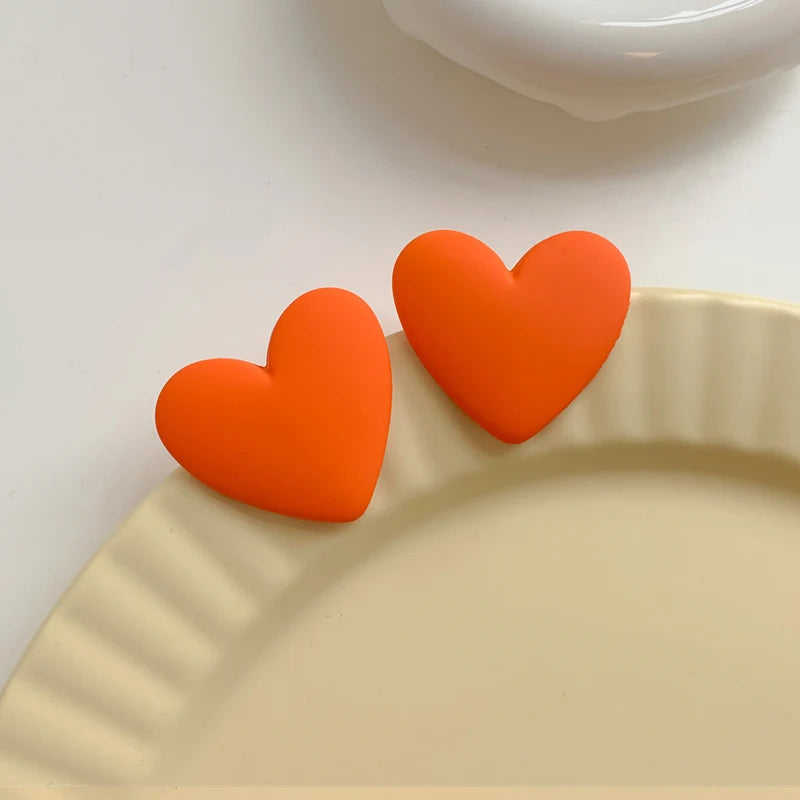 Orange velvet heart earrings