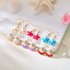Boucles d'oreilles coquillage pendantes colorées 