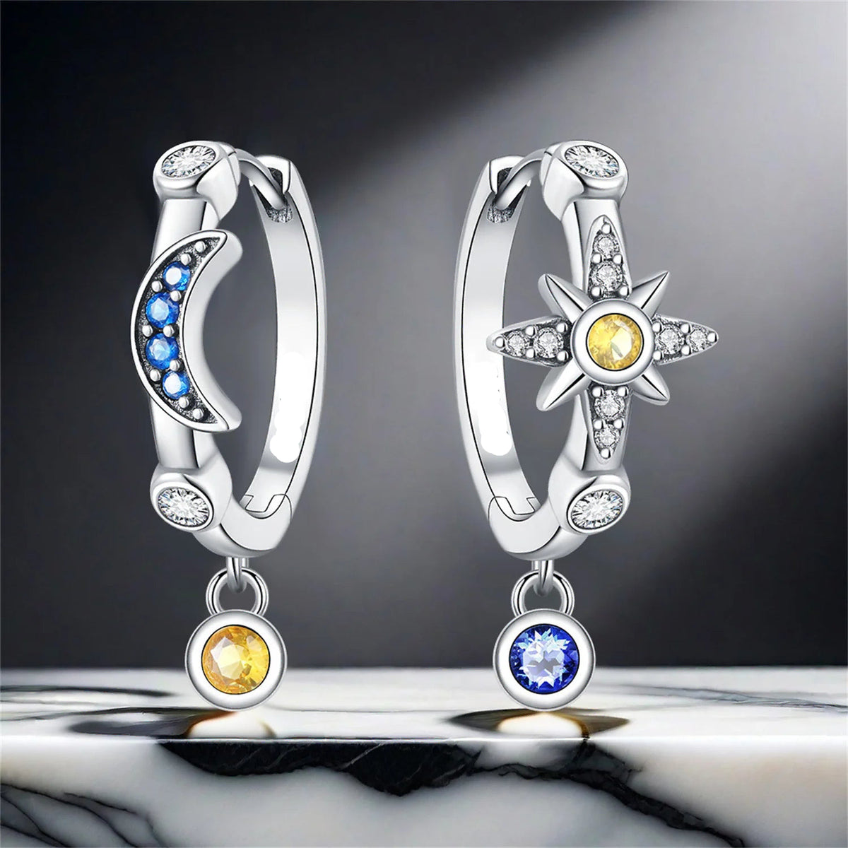 Boucles d'oreilles créoles asymétriques lune et soleil
