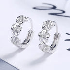 Hoop earrings with trio of flowers