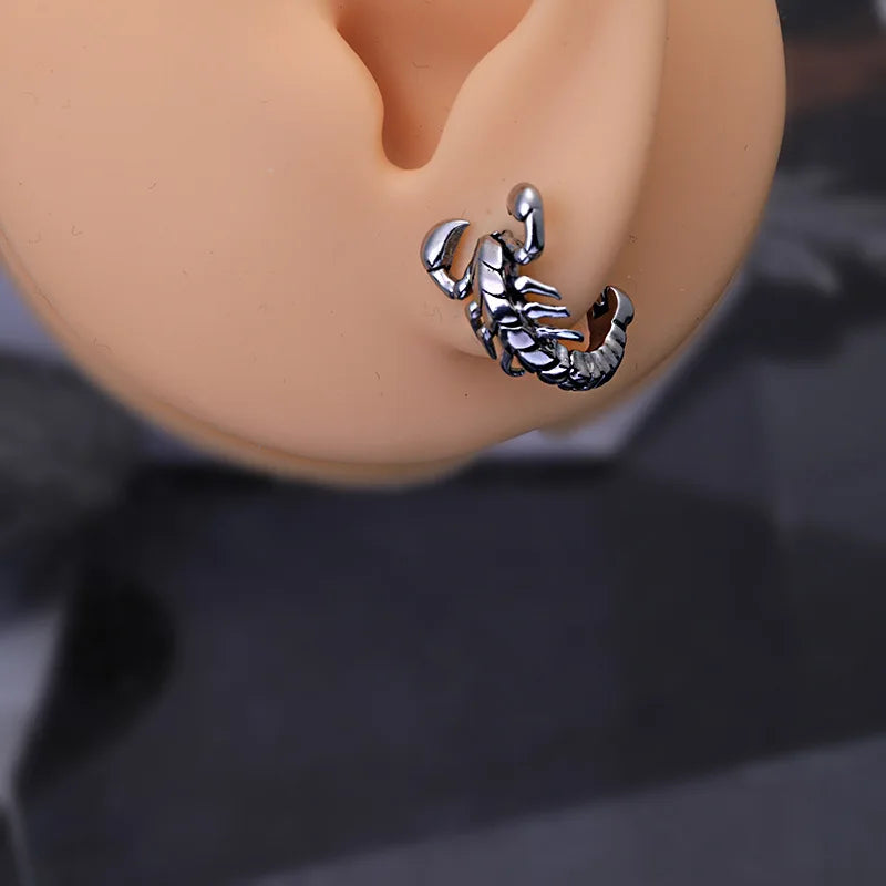 Boucles d'oreilles créoles squelette de scorpion et tête de mort