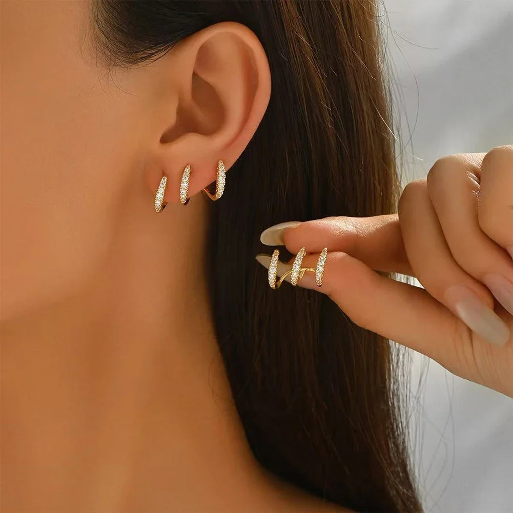 Boucles d'oreilles élégantes avec strass à trois griffes